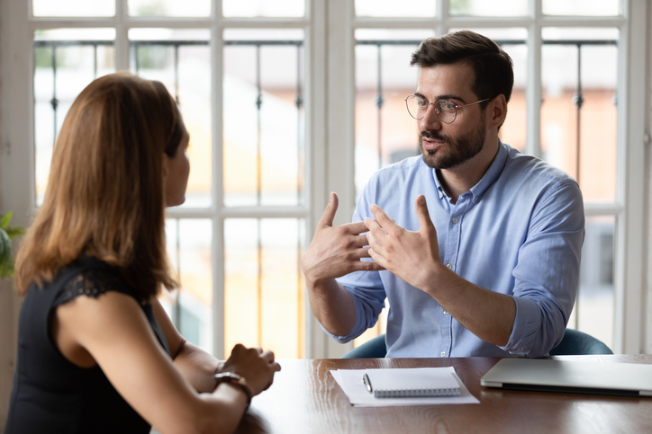 A financial advisor explaining an investment strategy to a client.